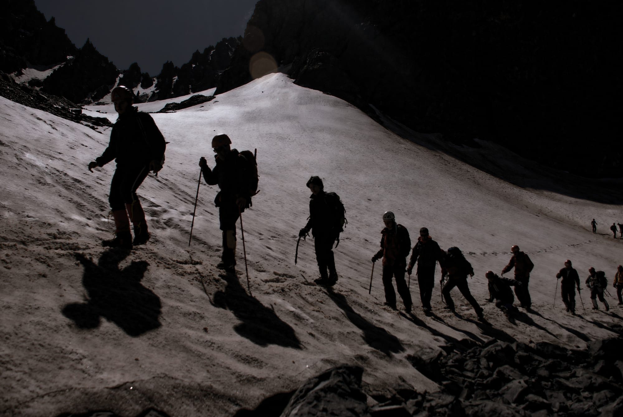 Snowy Mountain Hiking Expedition in Twilight. 
